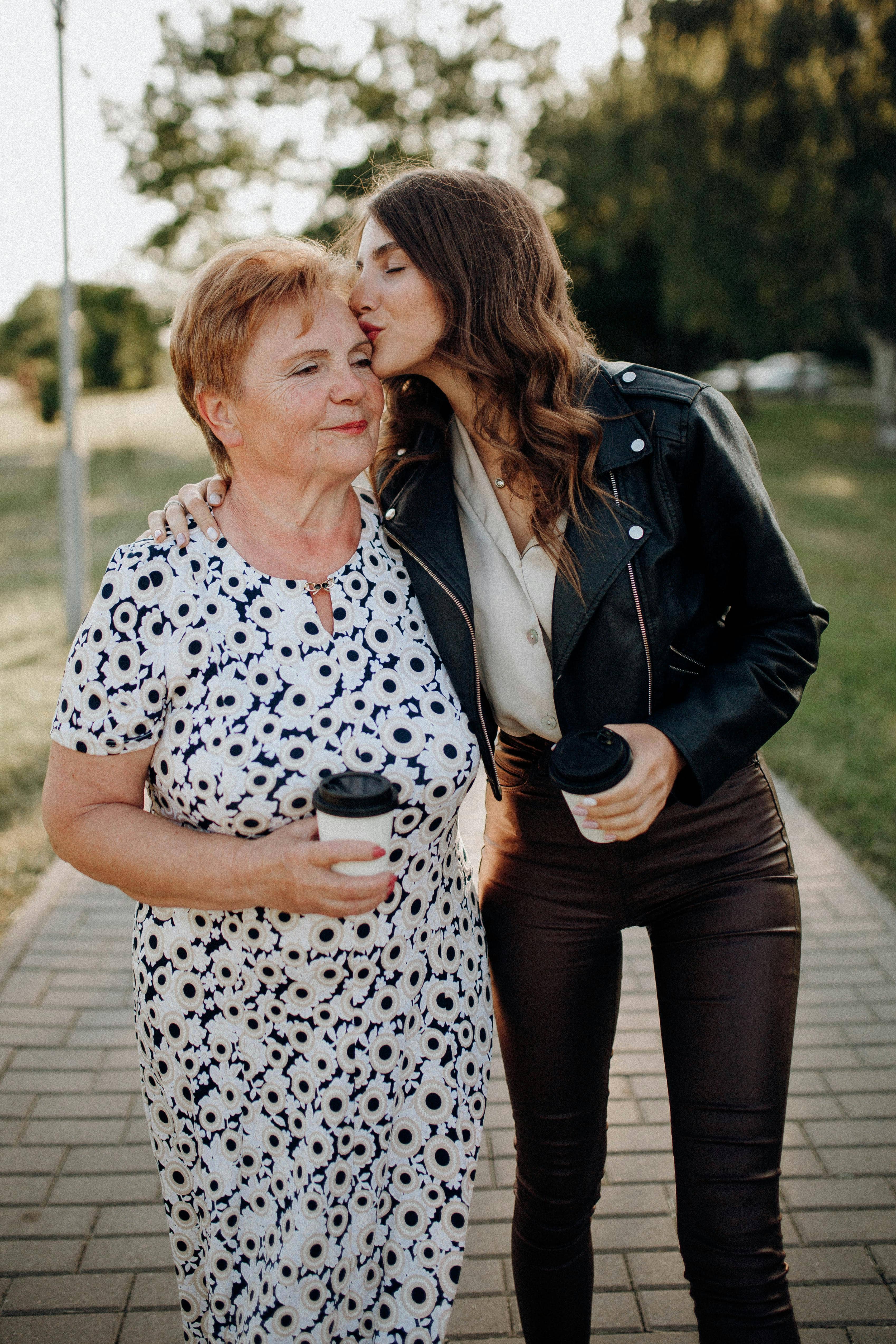 Mother and daughter sharing a moment at assisted living facility